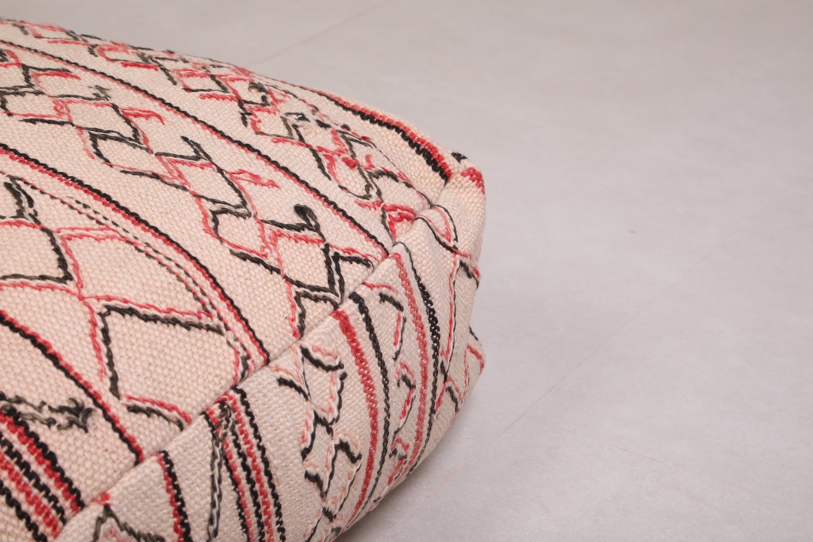 Minimalist Moroccan Pouf | Red and Black Linework on Natural Wool - Image 2