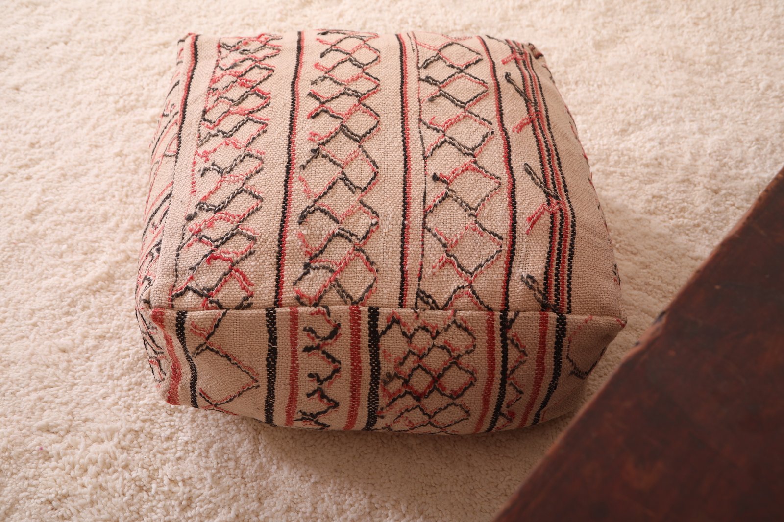Minimalist Moroccan Pouf | Red and Black Linework on Natural Wool - Image 6